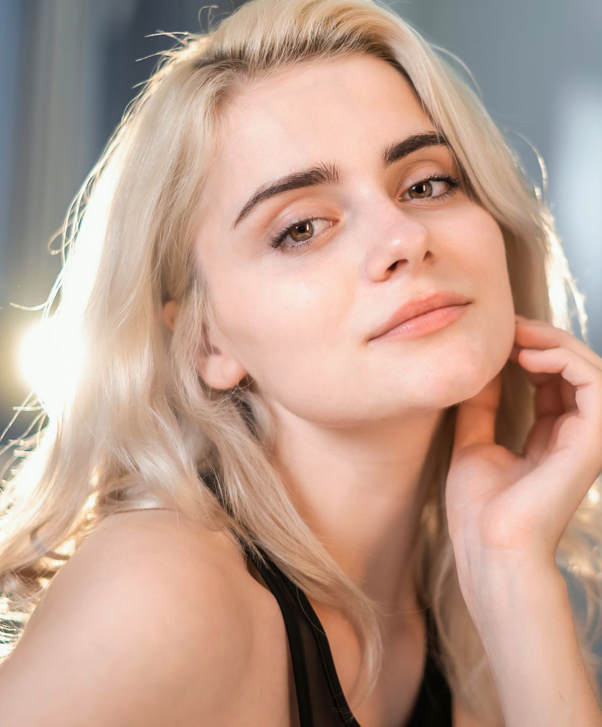 Portrait of a woman with blonde hair.